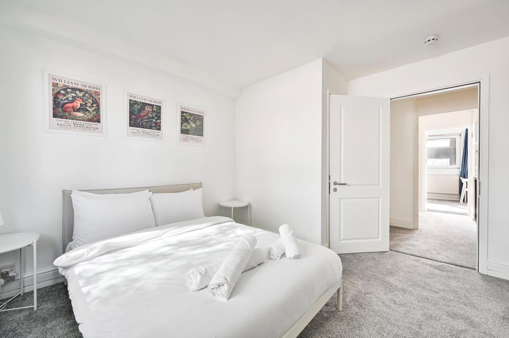 Апартаменты Guestready - Lovely Townhouse In West Kensington Лондон